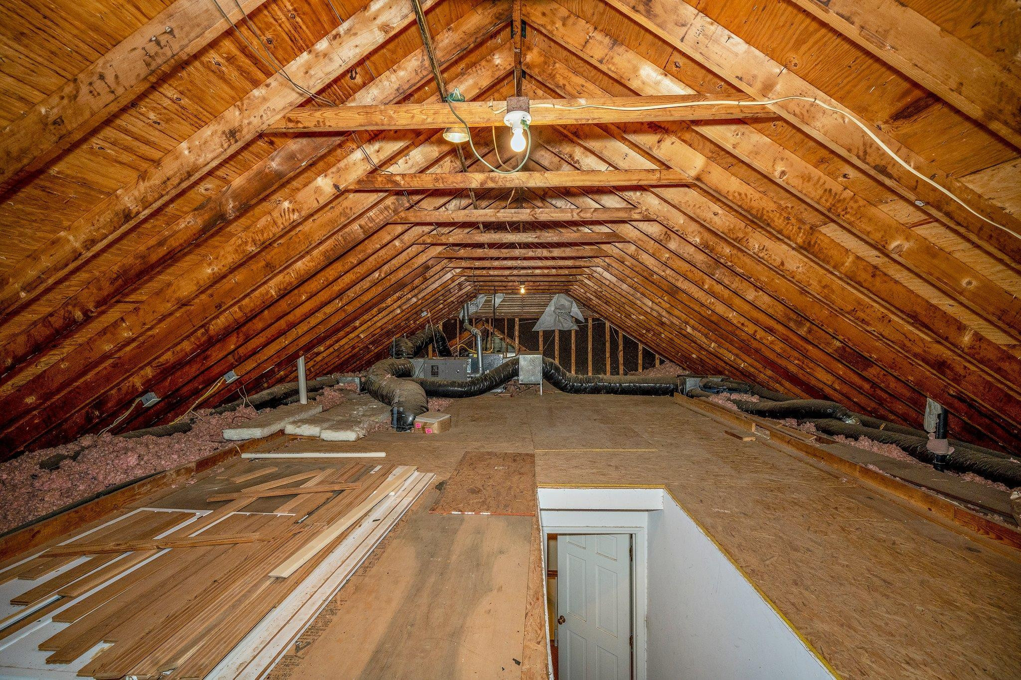 1512 Pony Run Road Raleigh, NC 27615 - Photo 27 of 39 Walk-up Attic offers Amazing Storage Space Walk-up Attic