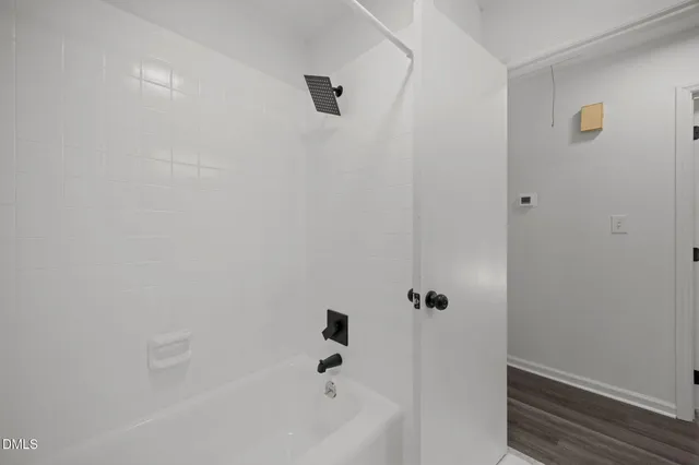 a bathroom with a bathtub