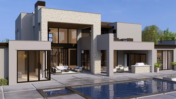 a view of a house with sitting area and garden