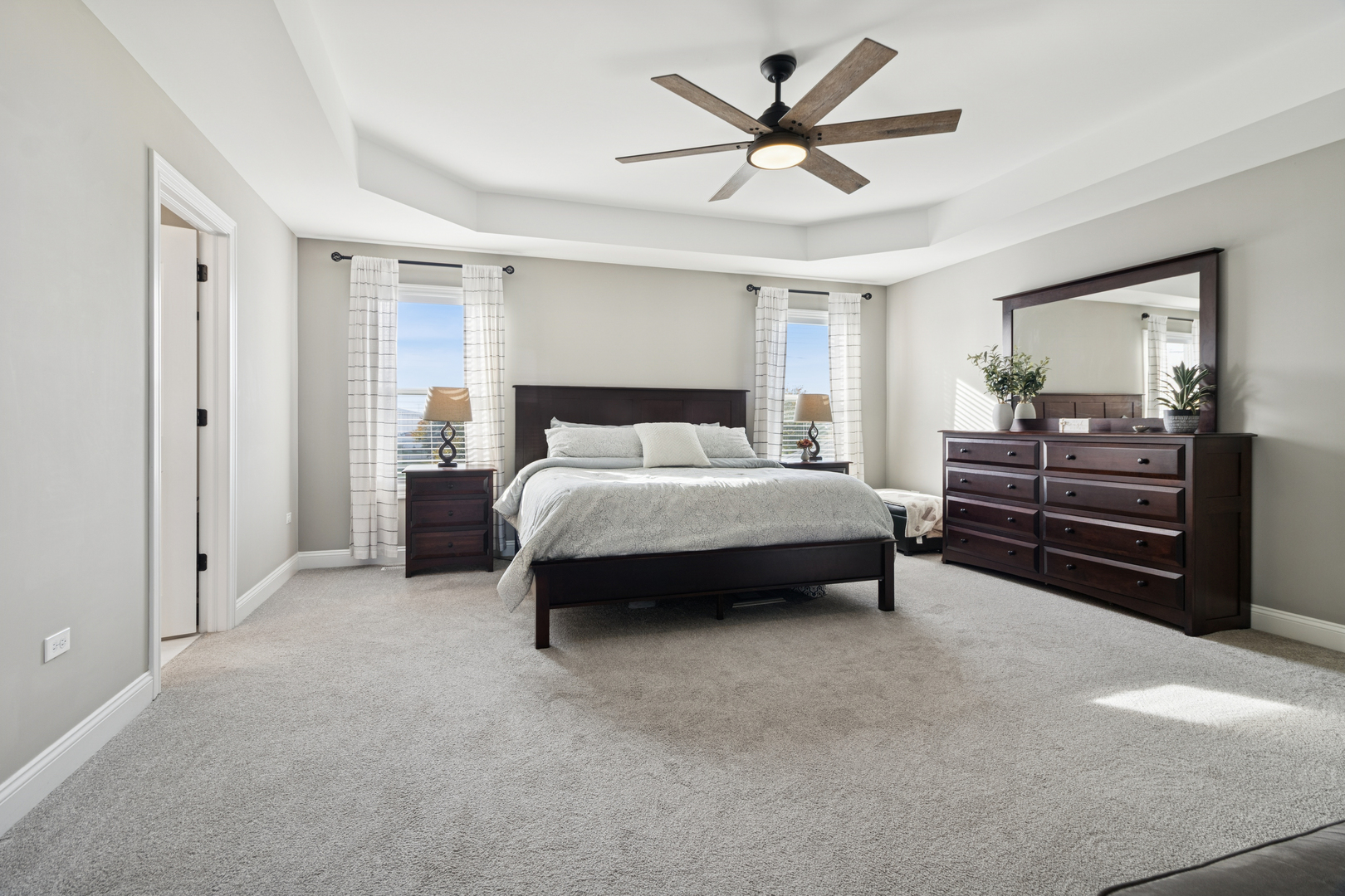 1647 Cobb Street New Lenox, IL 60451 - Photo 17 of 30 a bedroom with a bed a dresser and a window