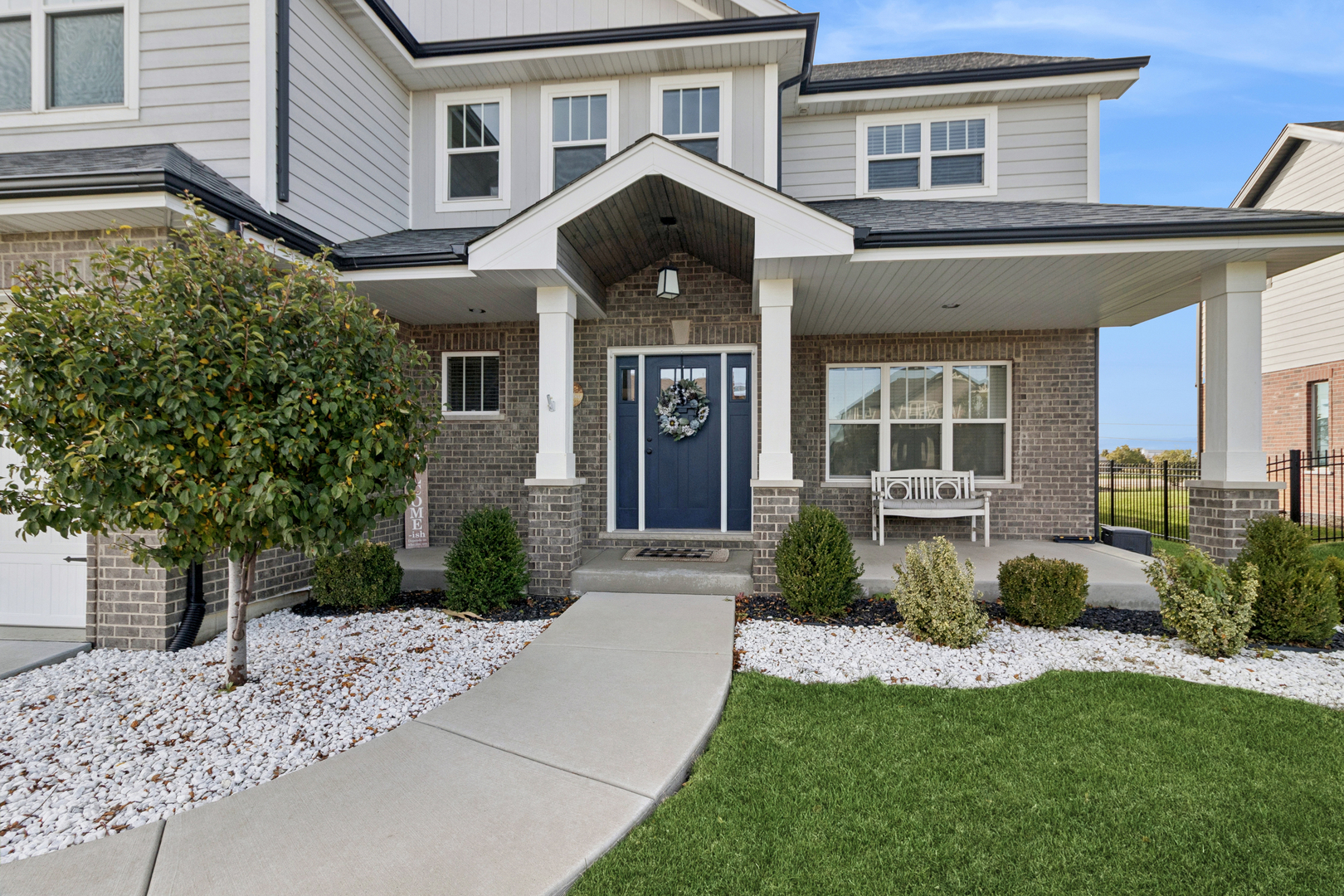 1647 Cobb Street New Lenox, IL 60451 - Photo 2 of 30 a front view of a house with a yard