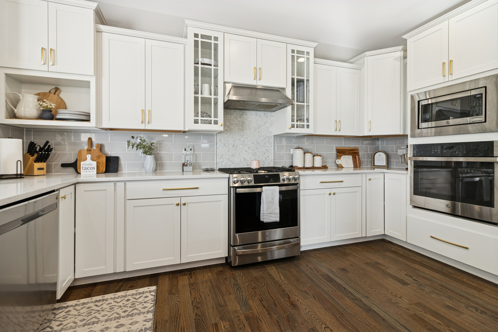 1647 Cobb Street New Lenox, IL 60451 - Photo 8 of 30 a kitchen with cabinets stainless steel appliances and wooden floor