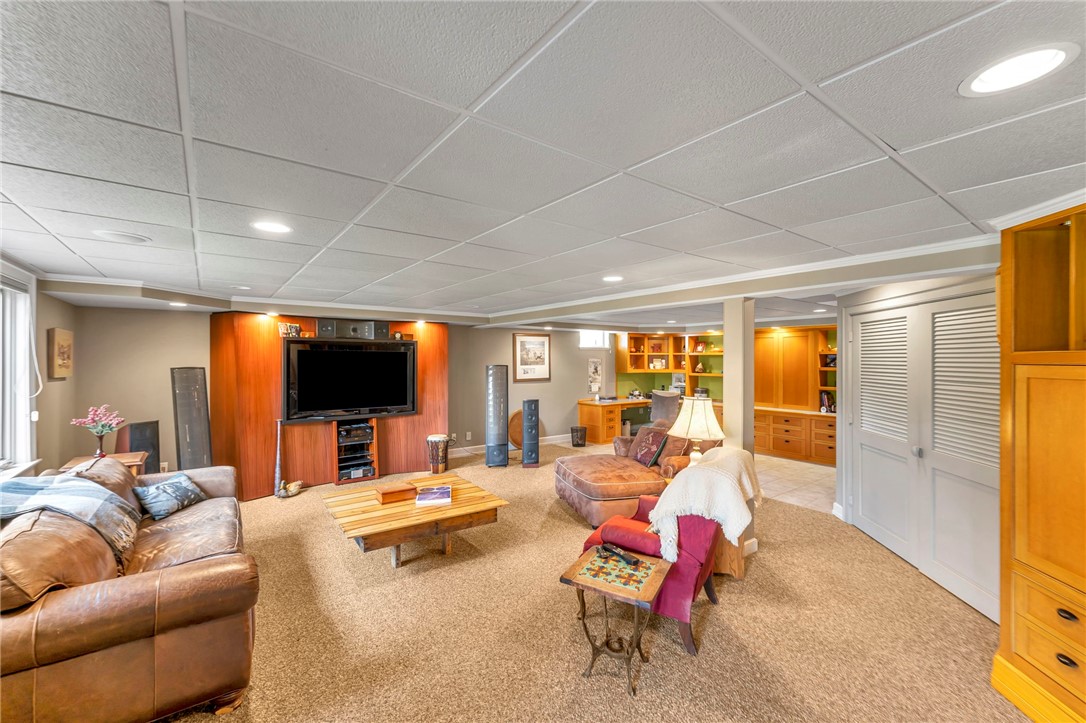 3843 State Street Oneonta, NY 13820 - Photo 17 of 43 Family room with custom built entertainment unit a