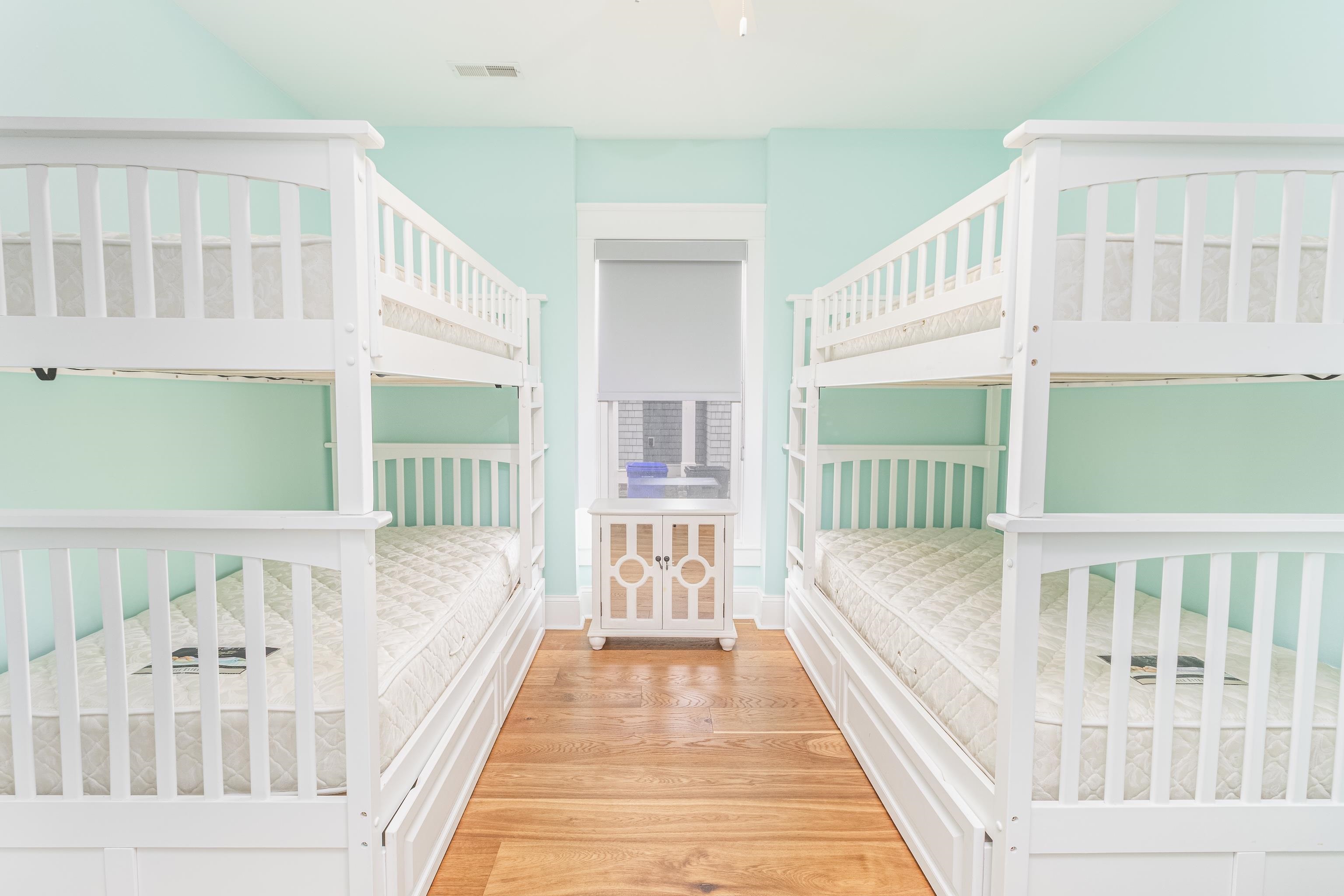 25 West 32nd Avalon, NJ 08202 - Photo 16 of 40 a view of a bedroom with wooden floor