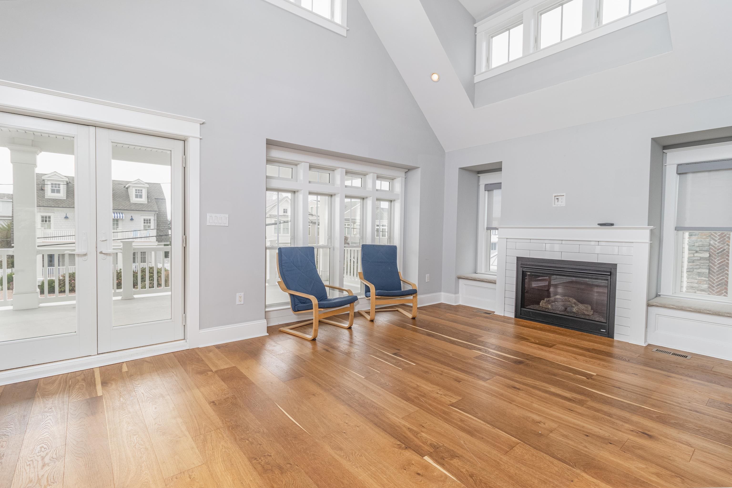 25 West 32nd Avalon, NJ 08202 - Photo 19 of 40 a view of a livingroom with a fireplace and window