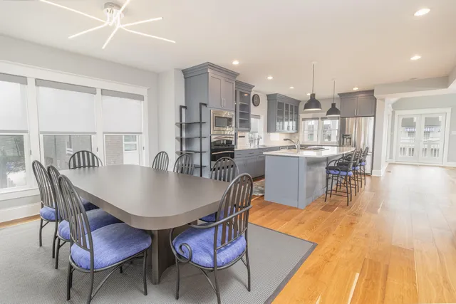 a bathroom with a sink toilet and mirror