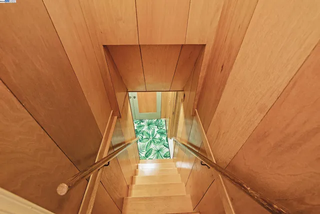 a view of balcony with a potted plant