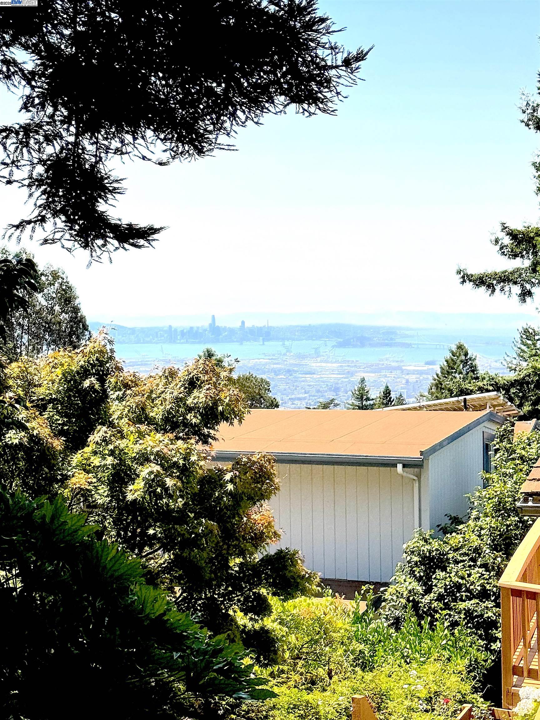 2863 Burton Drive Oakland, CA 94611 - Photo 33 of 34 a view of a garden with an outdoor space and seating area