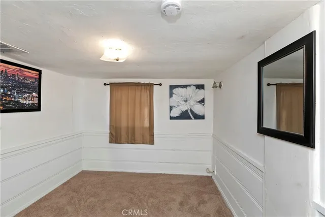 a view of a hallway with closet