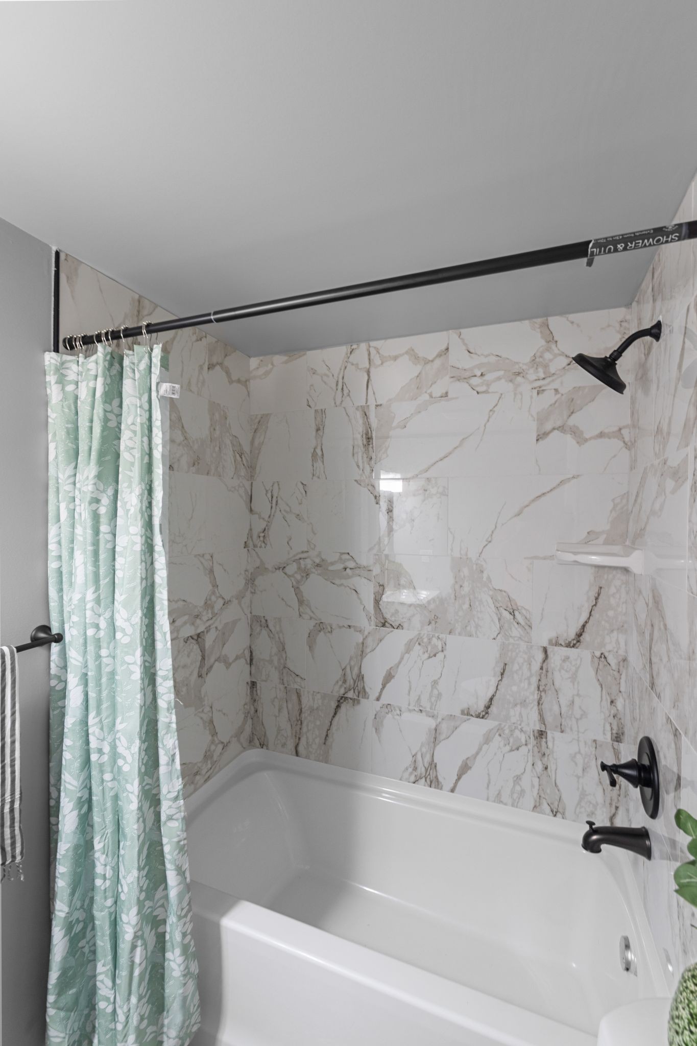 544 Stones River Road La Vergne, TN 37086 - Photo 17 of 27 a bathroom with a shower and a tub