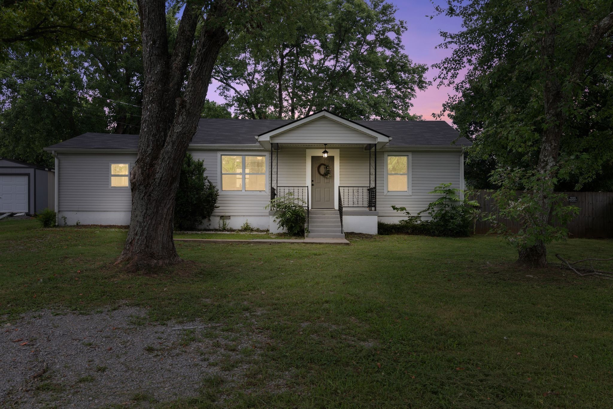 544 Stones River Road La Vergne, TN 37086 - Photo 2 of 27 a front view of a house with garden