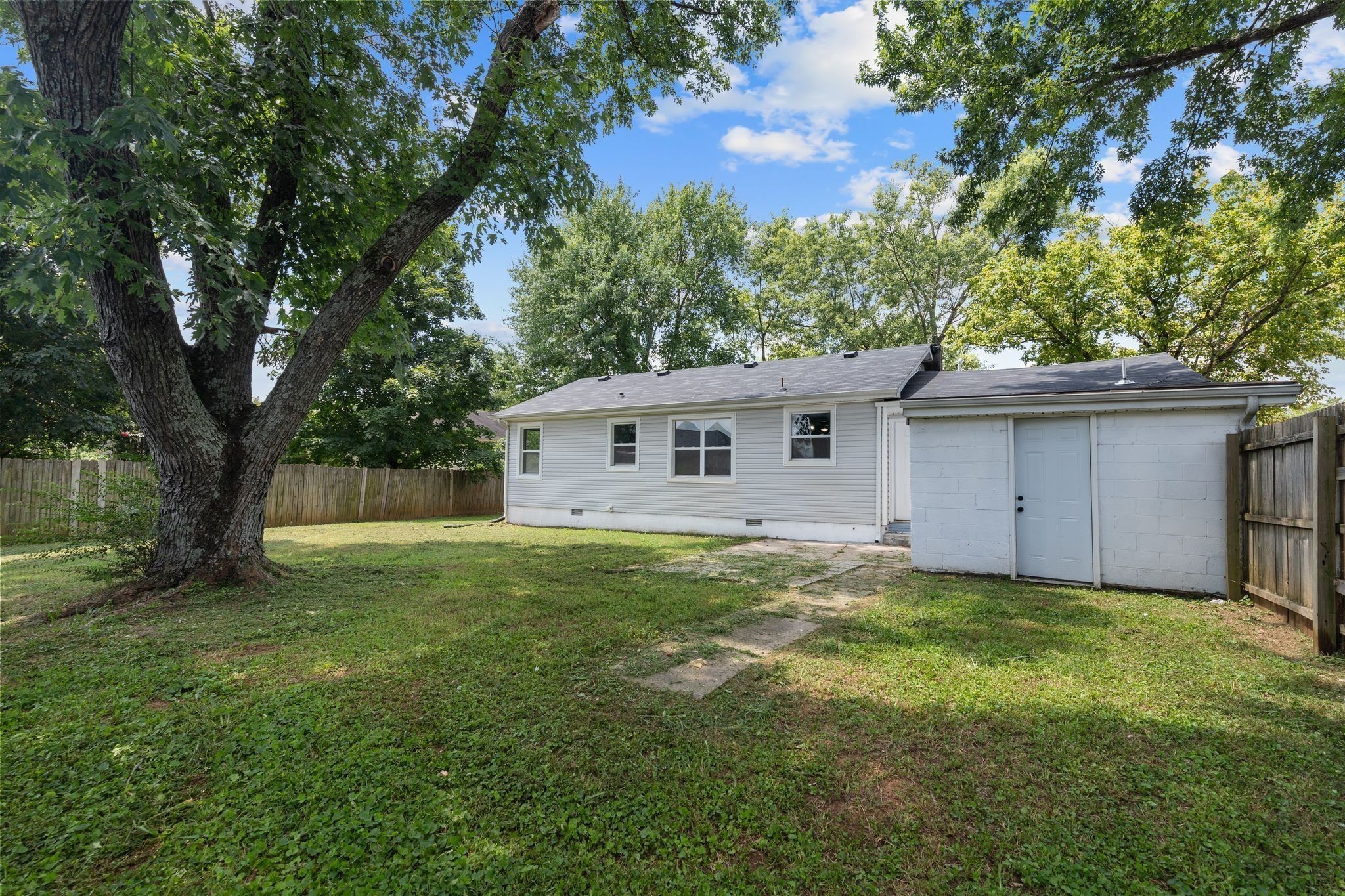 544 Stones River Road La Vergne, TN 37086 - Photo 25 of 27 a view of a yard in front of a house with large tree