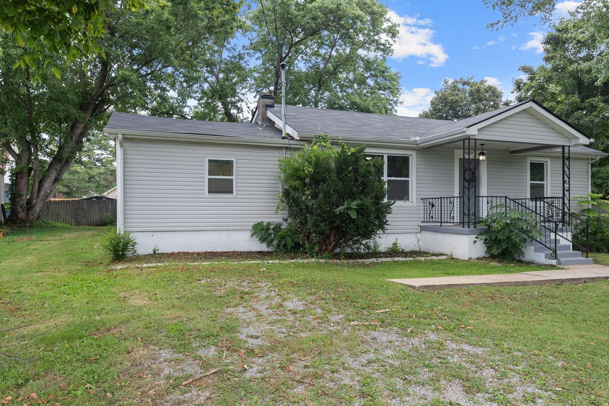 544 Stones River Road La Vergne, TN 37086 - Photo 5 of 27 a view of a house with a yard