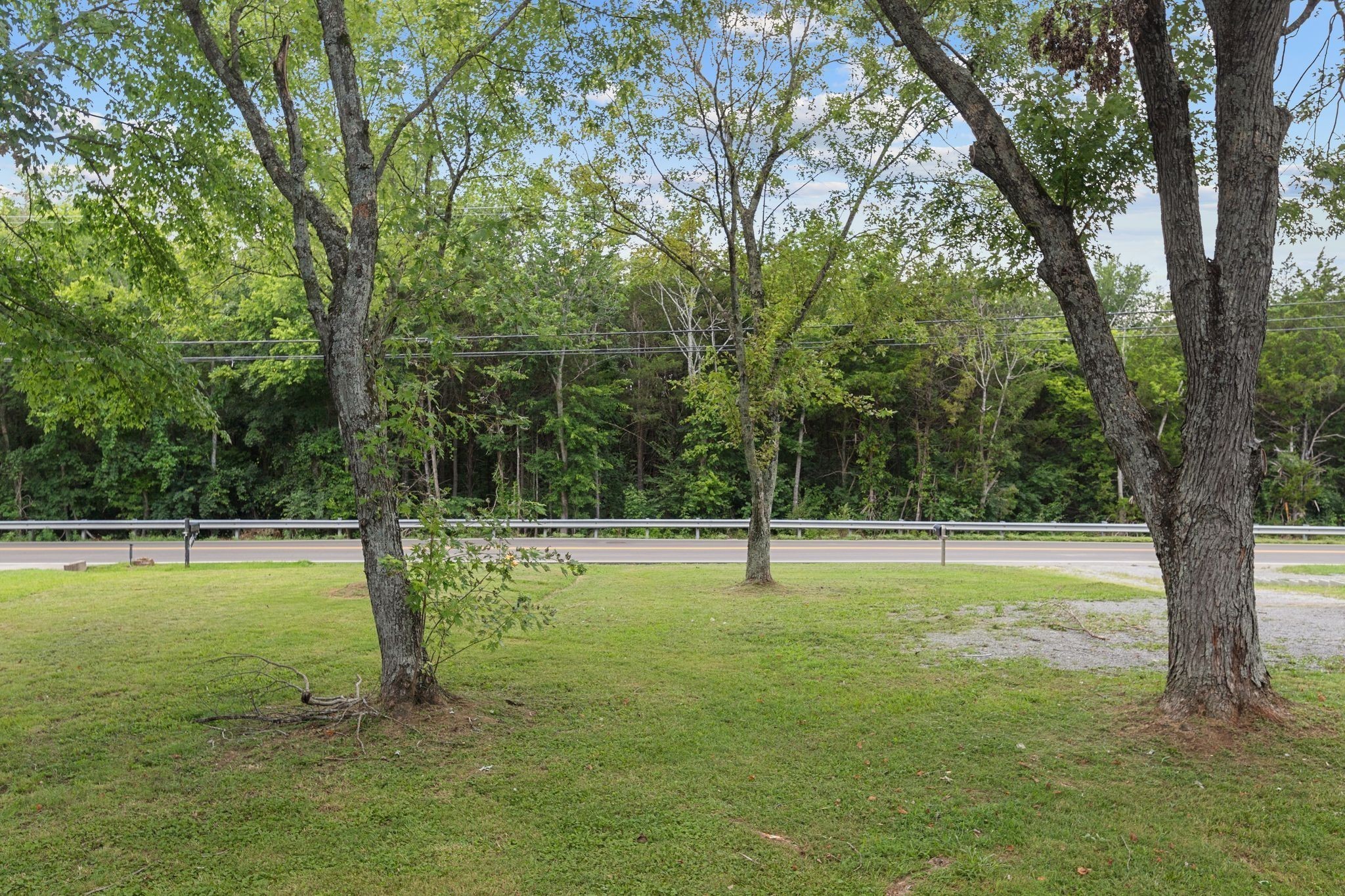 544 Stones River Road La Vergne, TN 37086 - Photo 7 of 27 a view of a swimming pool with a tree