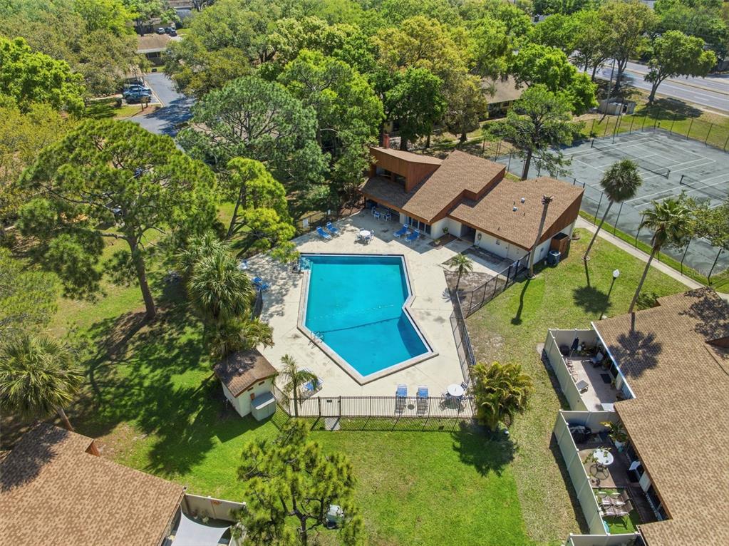 2074 Sunset Point Road, Unit 137 Clearwater, FL 33765 - Photo 29 of 32 an aerial view of a house with garden space and street view