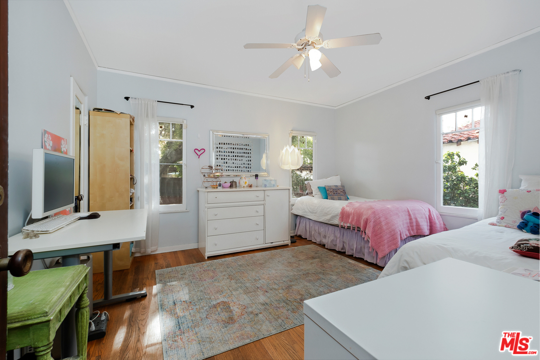 806 Palm Drive Glendale, CA 91202 - Photo 17 of 29 a bedroom with two beds and a flat screen tv