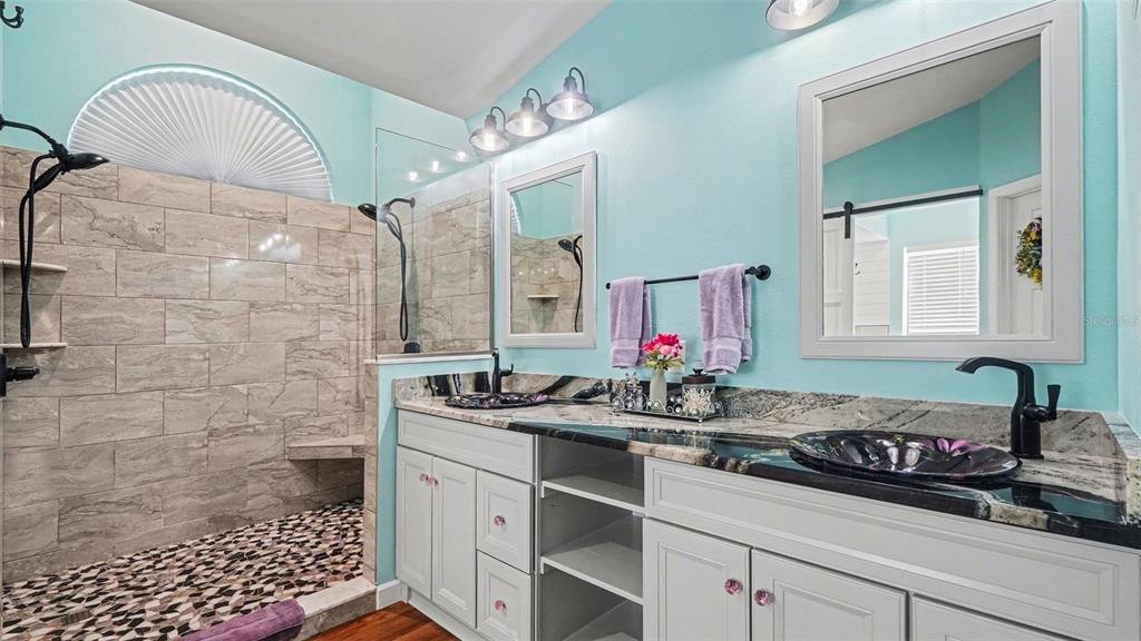 17 Longleaf Court Homosassa, FL 34446 - Photo 18 of 30 a bathroom with a sink a vanity and a mirror