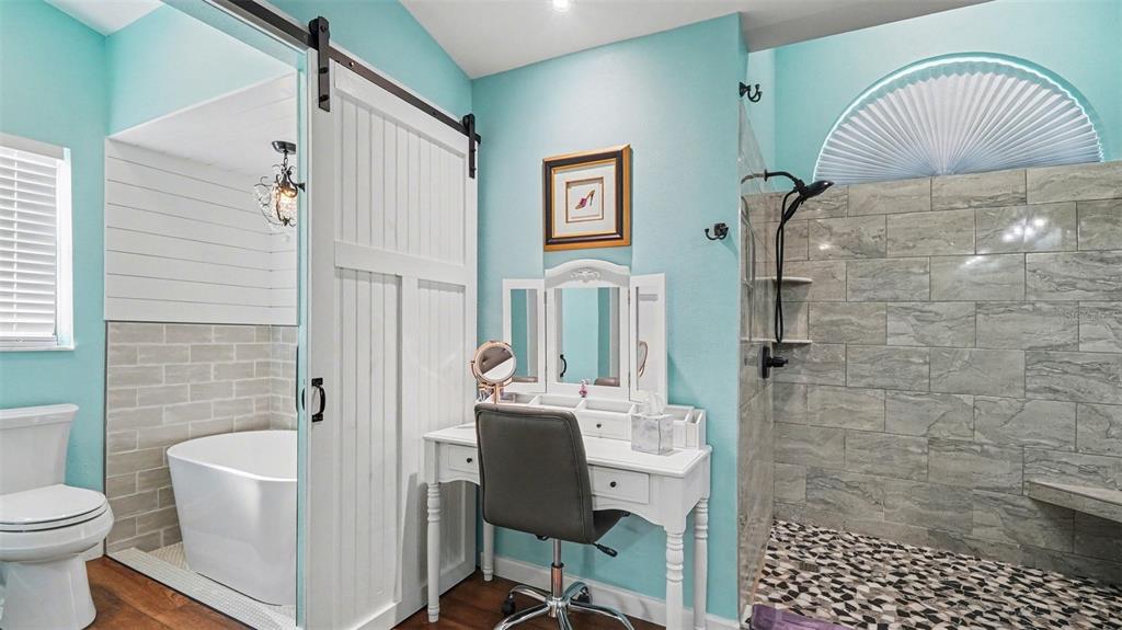 17 Longleaf Court Homosassa, FL 34446 - Photo 19 of 30 a bathroom with a toilet sink and shower