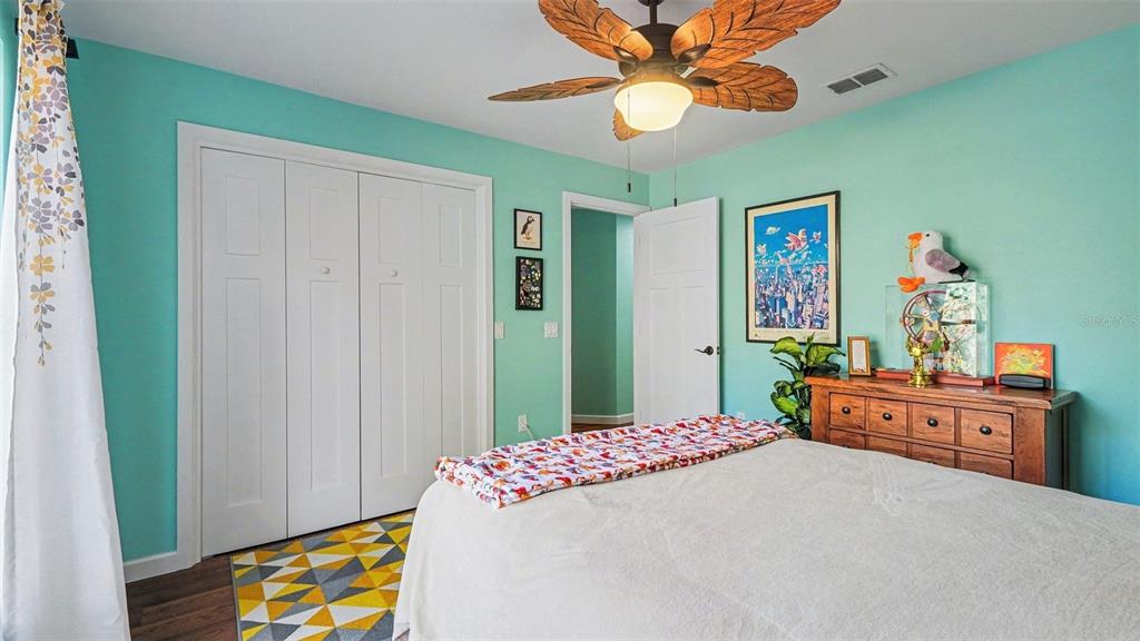 17 Longleaf Court Homosassa, FL 34446 - Photo 21 of 30 a bedroom with a bed dresser and a window