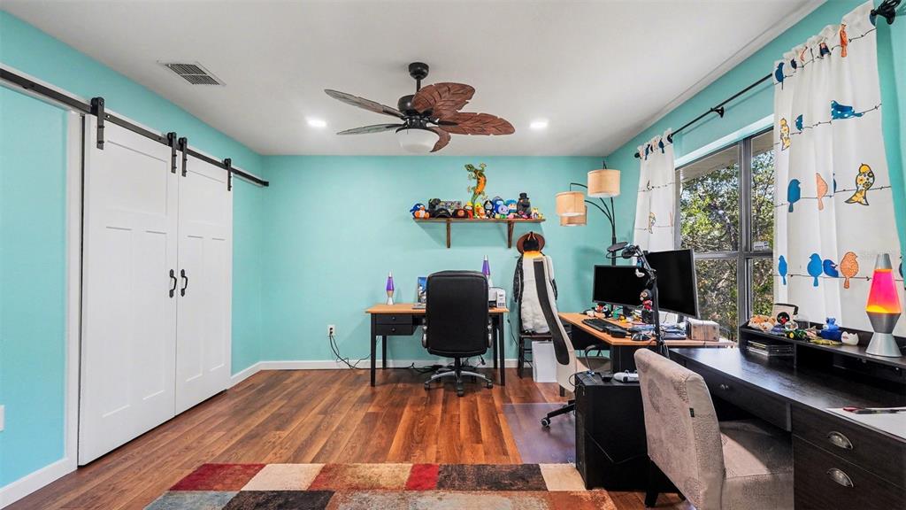17 Longleaf Court Homosassa, FL 34446 - Photo 24 of 30 a view of a workspace with furniture and a window