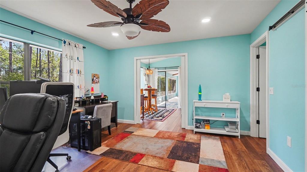 17 Longleaf Court Homosassa, FL 34446 - Photo 25 of 30 a view of a livingroom with furniture and a ceiling fan