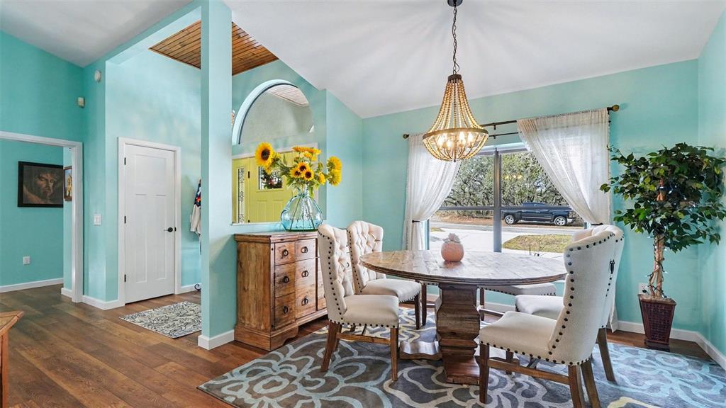17 Longleaf Court Homosassa, FL 34446 - Photo 9 of 30 a dining room table with chair and window