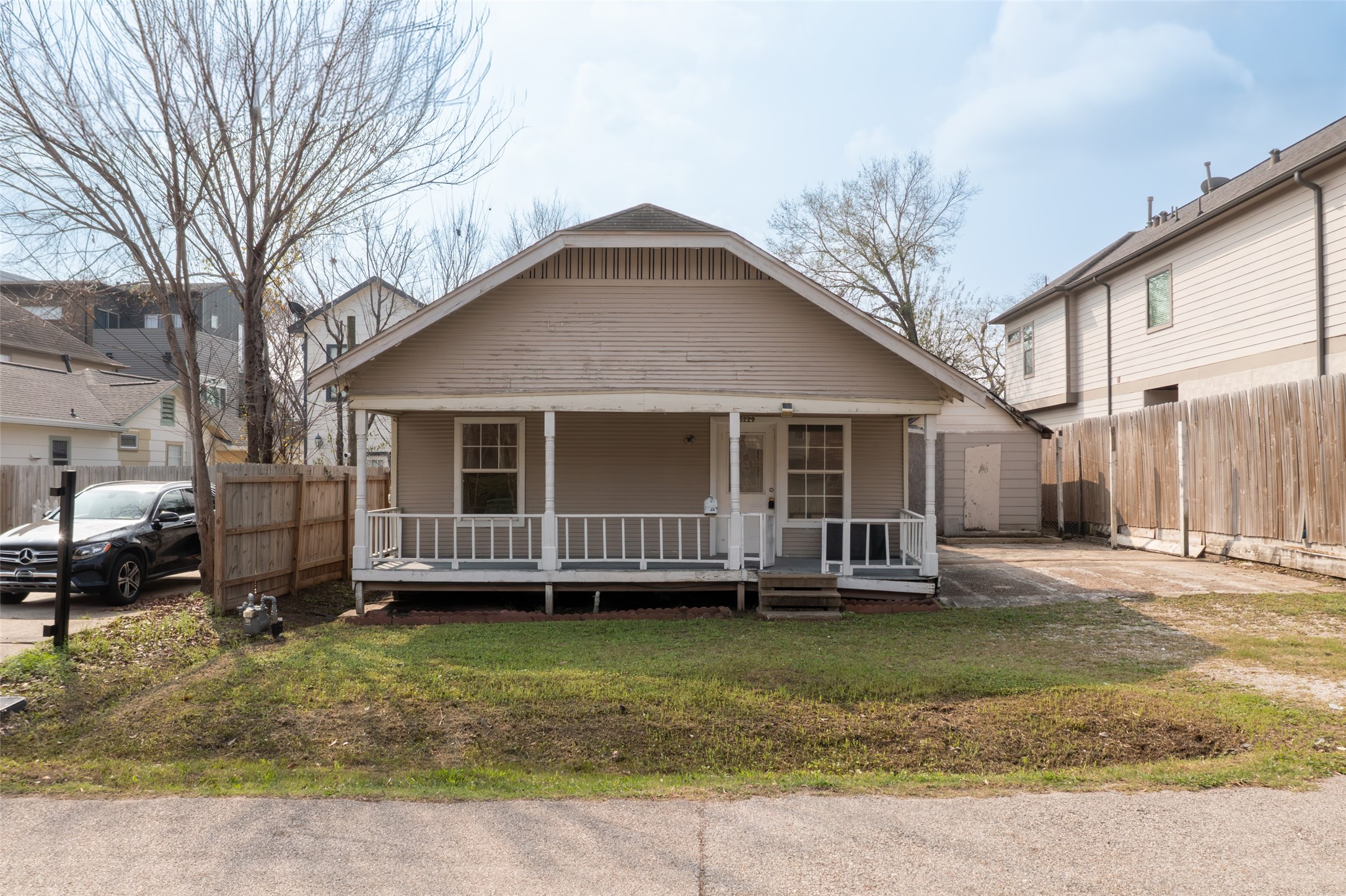 front view of a house with a yard