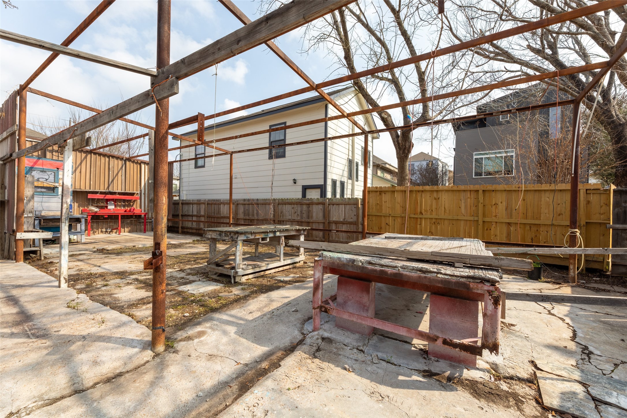 5229 Eigel Street Houston, TX 77007 - Photo 11 of 19 a view of a chairs with wooden fence