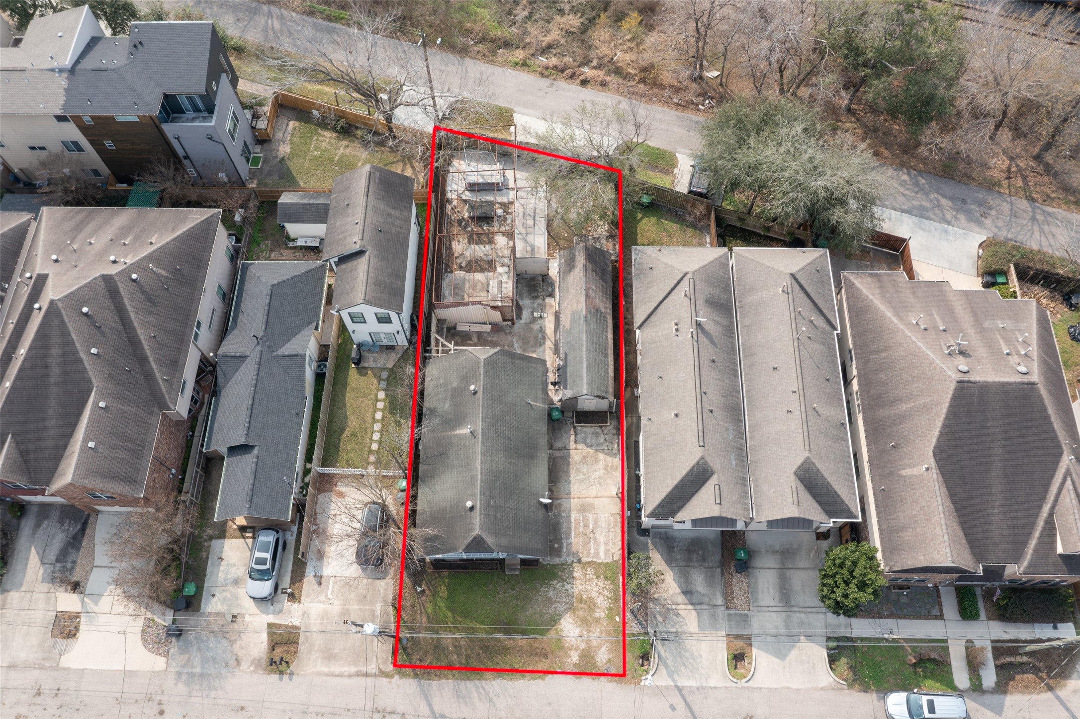 5229 Eigel Street Houston, TX 77007 - Photo 4 of 19 a street view with tall buildings