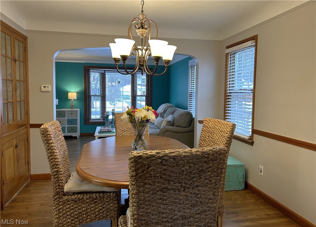 1748 Sunview Road Lyndhurst, OH 44124 - Photo 18 of 41 Dining area featuring an inviting chandelier.