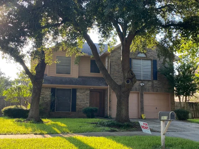 a view of a livingroom with an empty space and a window