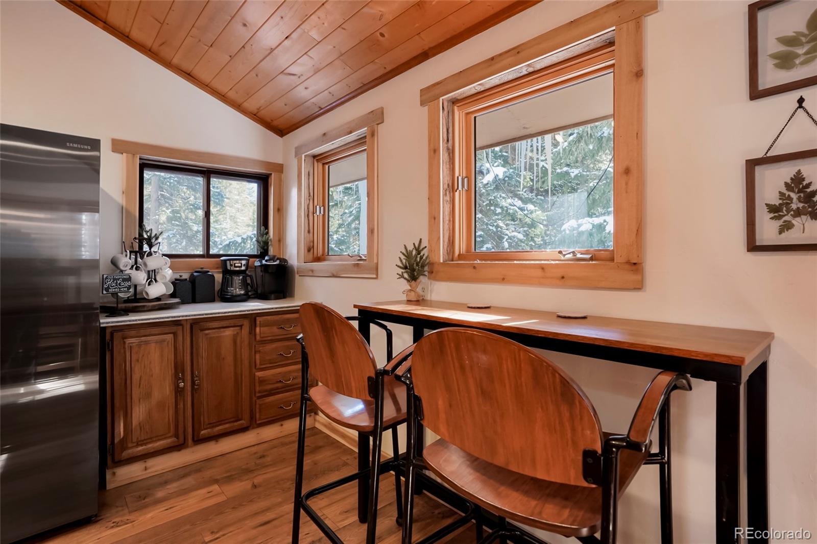 3237 Mill Creek Road Dumont, CO 80436 - Photo 15 of 48 a kitchen that has a sink a window and stainless steel appliances
