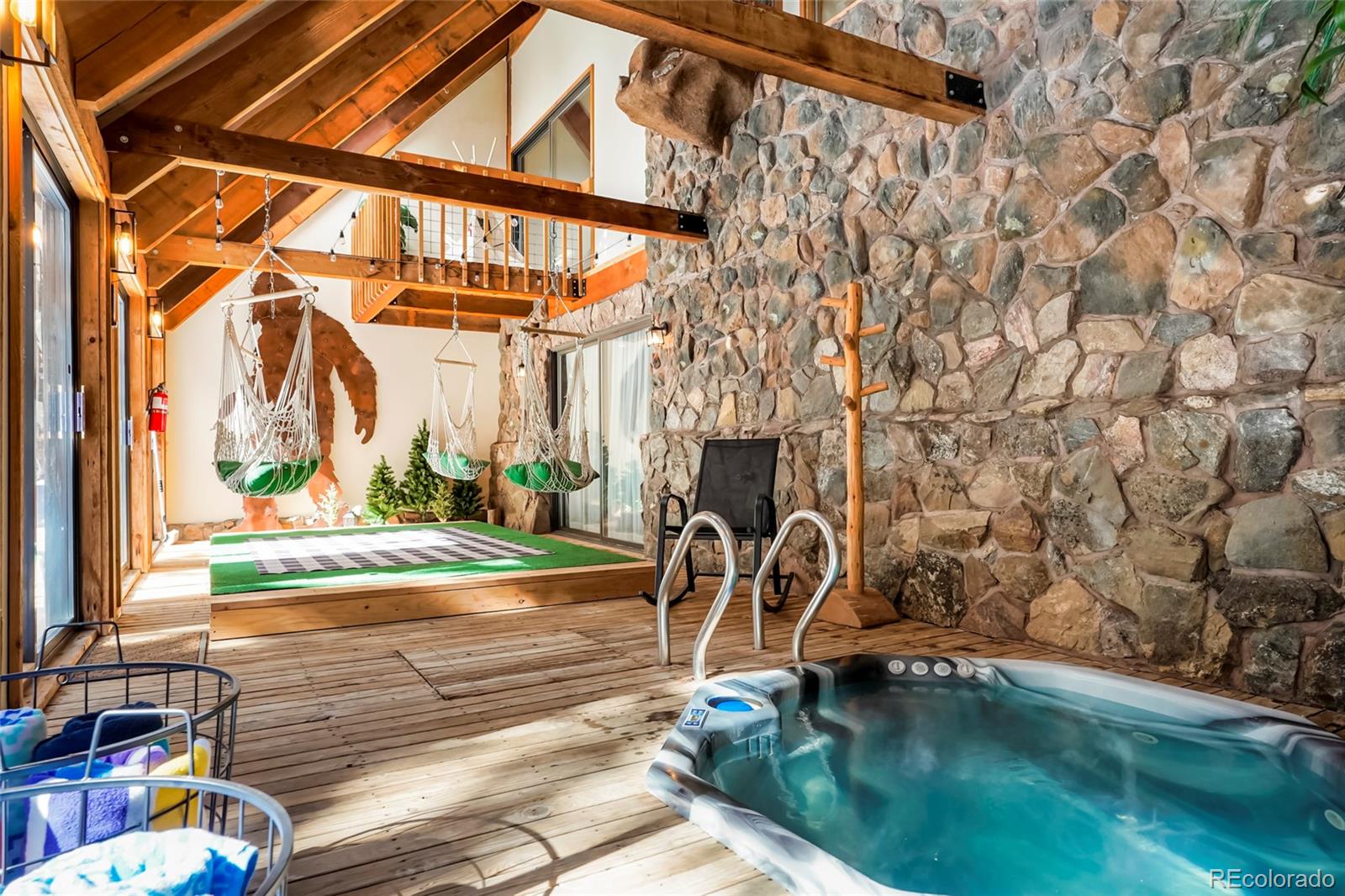 3237 Mill Creek Road Dumont, CO 80436 - Photo 18 of 48 a view of a backyard with a patio