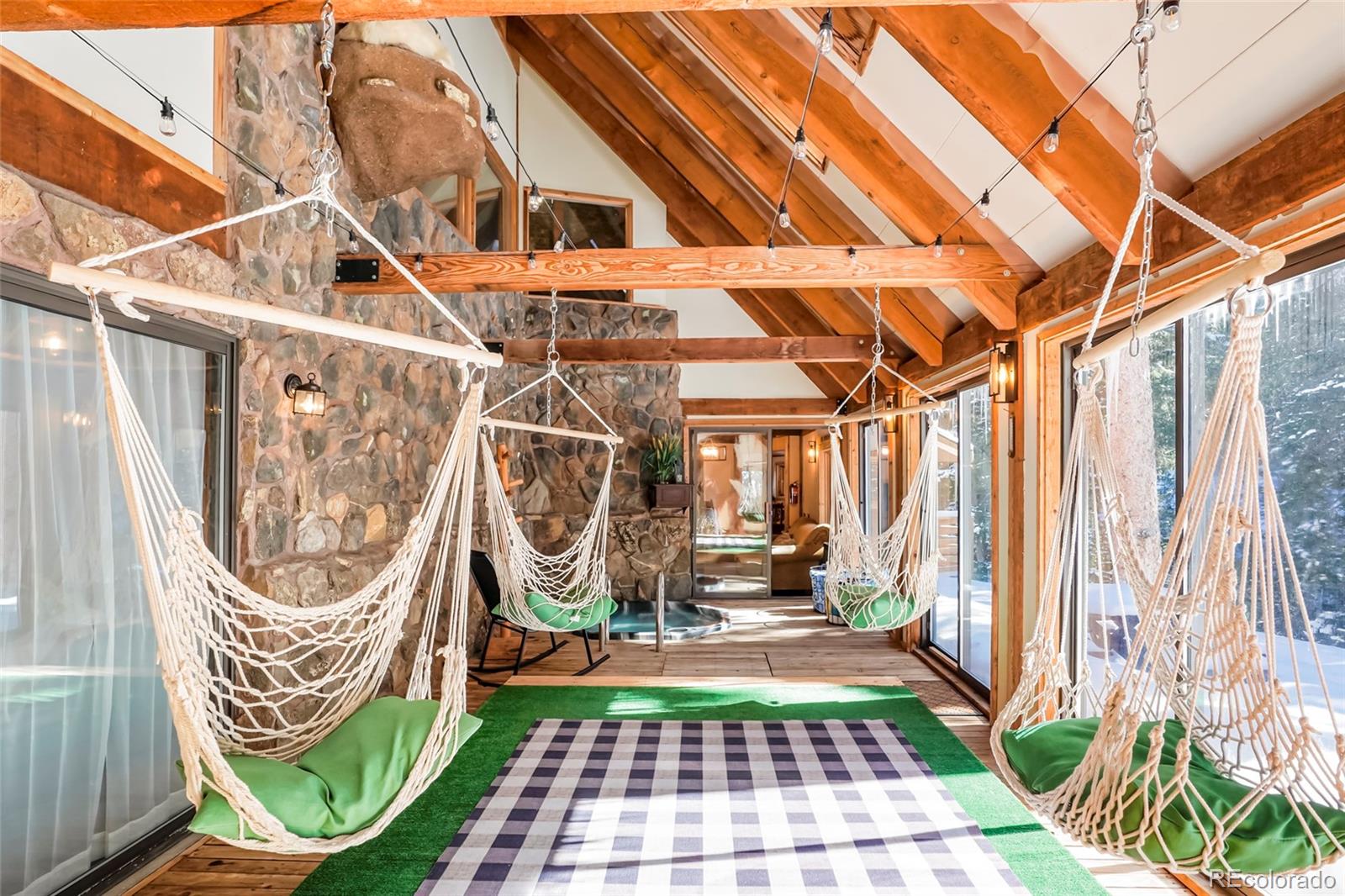 3237 Mill Creek Road Dumont, CO 80436 - Photo 19 of 48 a front view of a house with garden