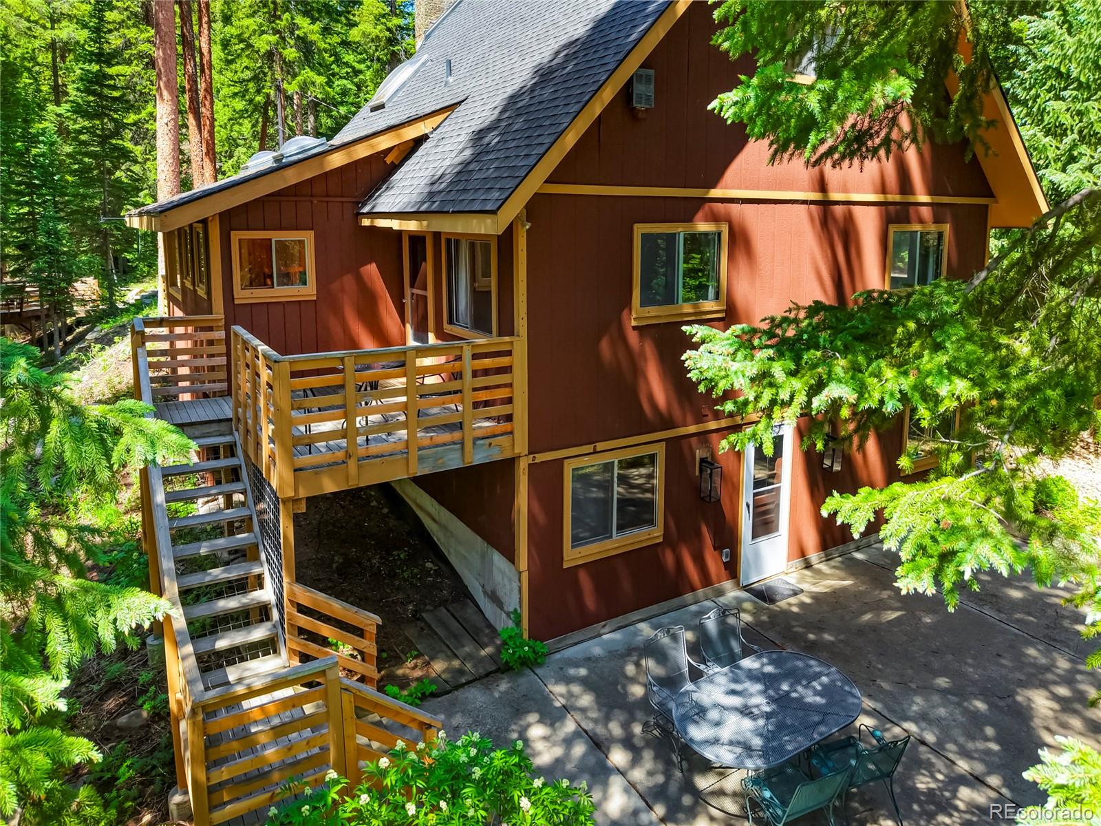 3237 Mill Creek Road Dumont, CO 80436 - Photo 3 of 48 a view of a house with brick walls