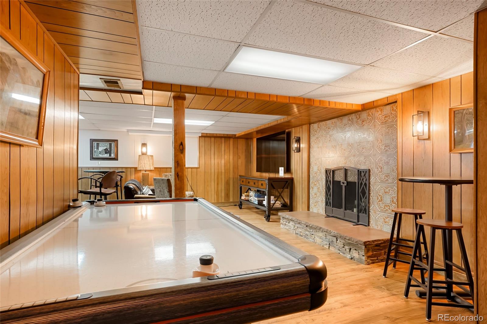 3237 Mill Creek Road Dumont, CO 80436 - Photo 35 of 48 a room with lots of furniture and mirrors