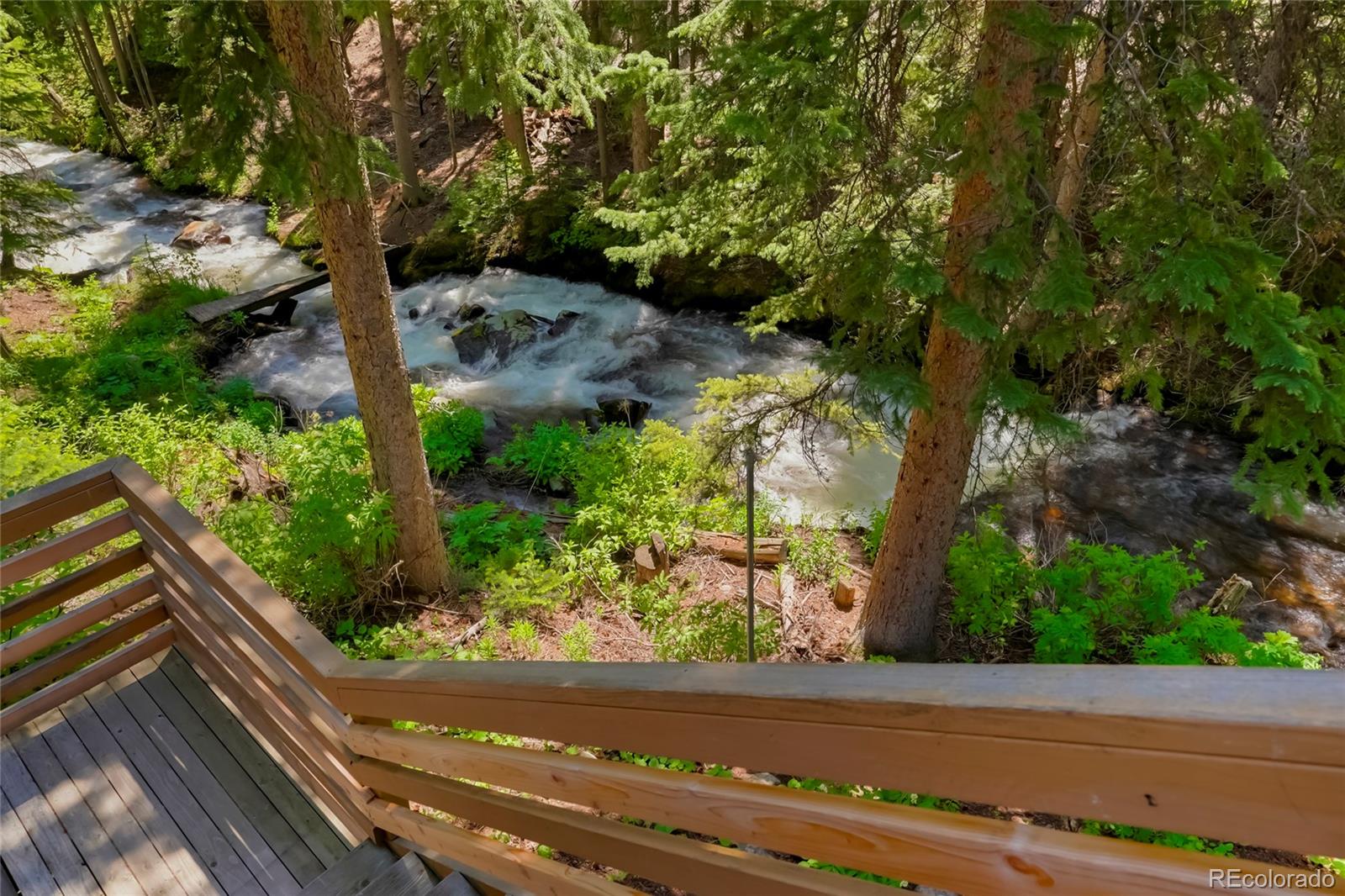 3237 Mill Creek Road Dumont, CO 80436 - Photo 44 of 48 a view of a yard with wooden fence