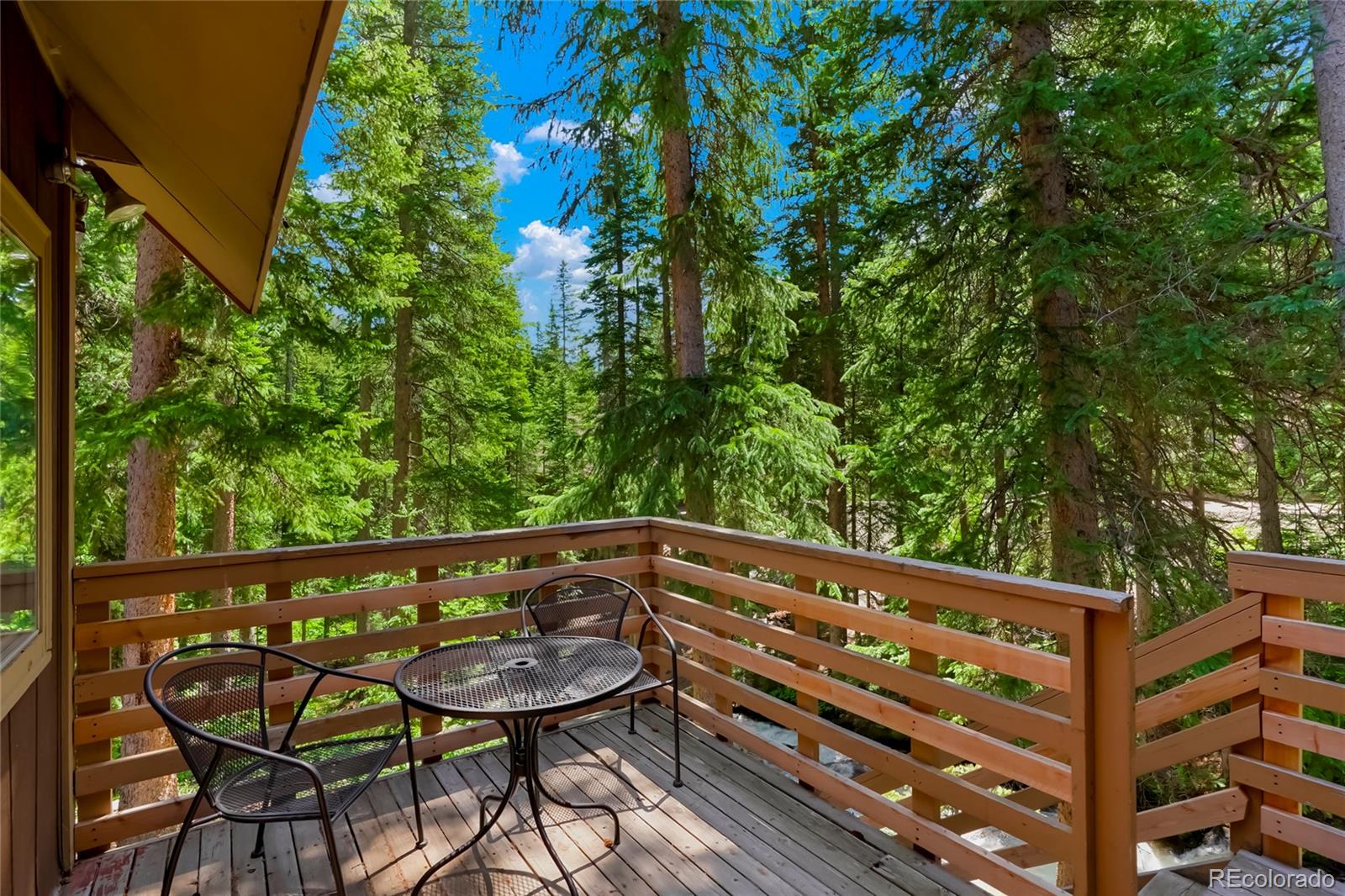 3237 Mill Creek Road Dumont, CO 80436 - Photo 45 of 48 a view of a bench in a balcony