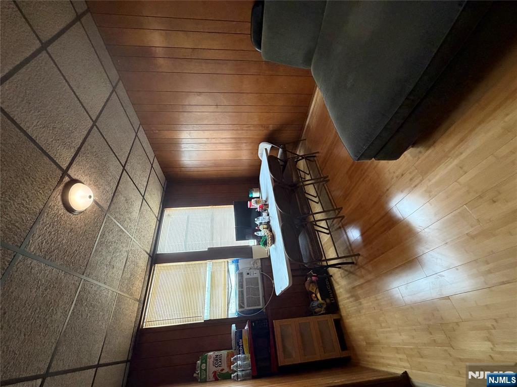 373 McKinley Street Fairview, NJ 07022 - Photo 6 of 8 a living room with furniture a piano and a pool table