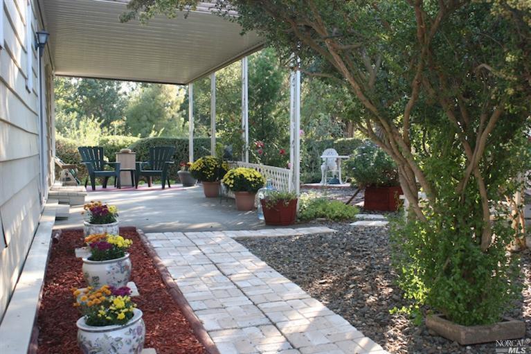 166 Sequoia Circle, Unit 166S Santa Rosa, CA 95401 - Photo 1 of 1 Beautiful gardens and entrance to the creekside home!