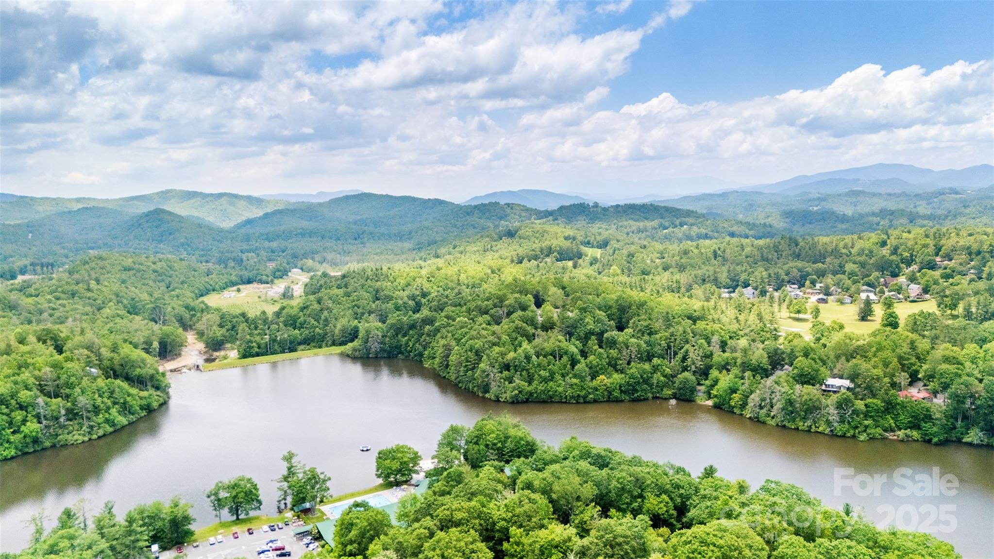 140 Pine View Road, Unit 43 Newland, NC 28657 - Photo 16 of 29 an aerial view of a house with yard and green space