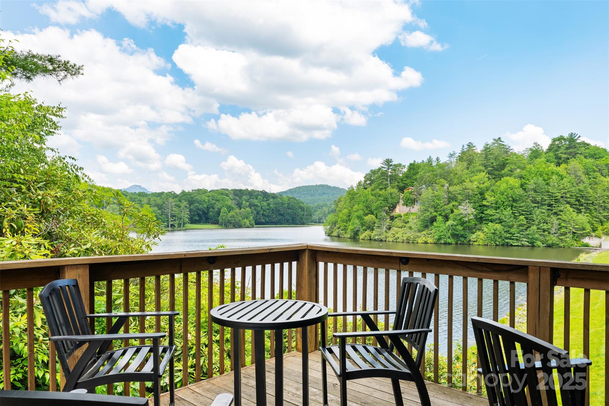 140 Pine View Road, Unit 43 Newland, NC 28657 - Photo 18 of 29 a view of a balcony with outdoor seating