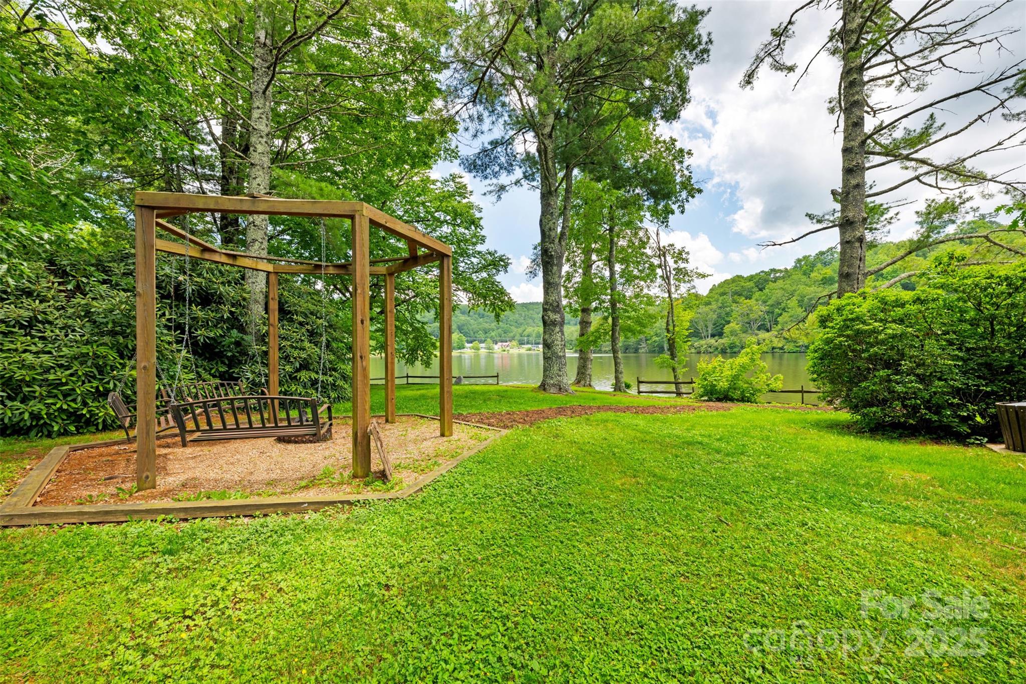 140 Pine View Road, Unit 43 Newland, NC 28657 - Photo 20 of 29 a view of a garden with a slide