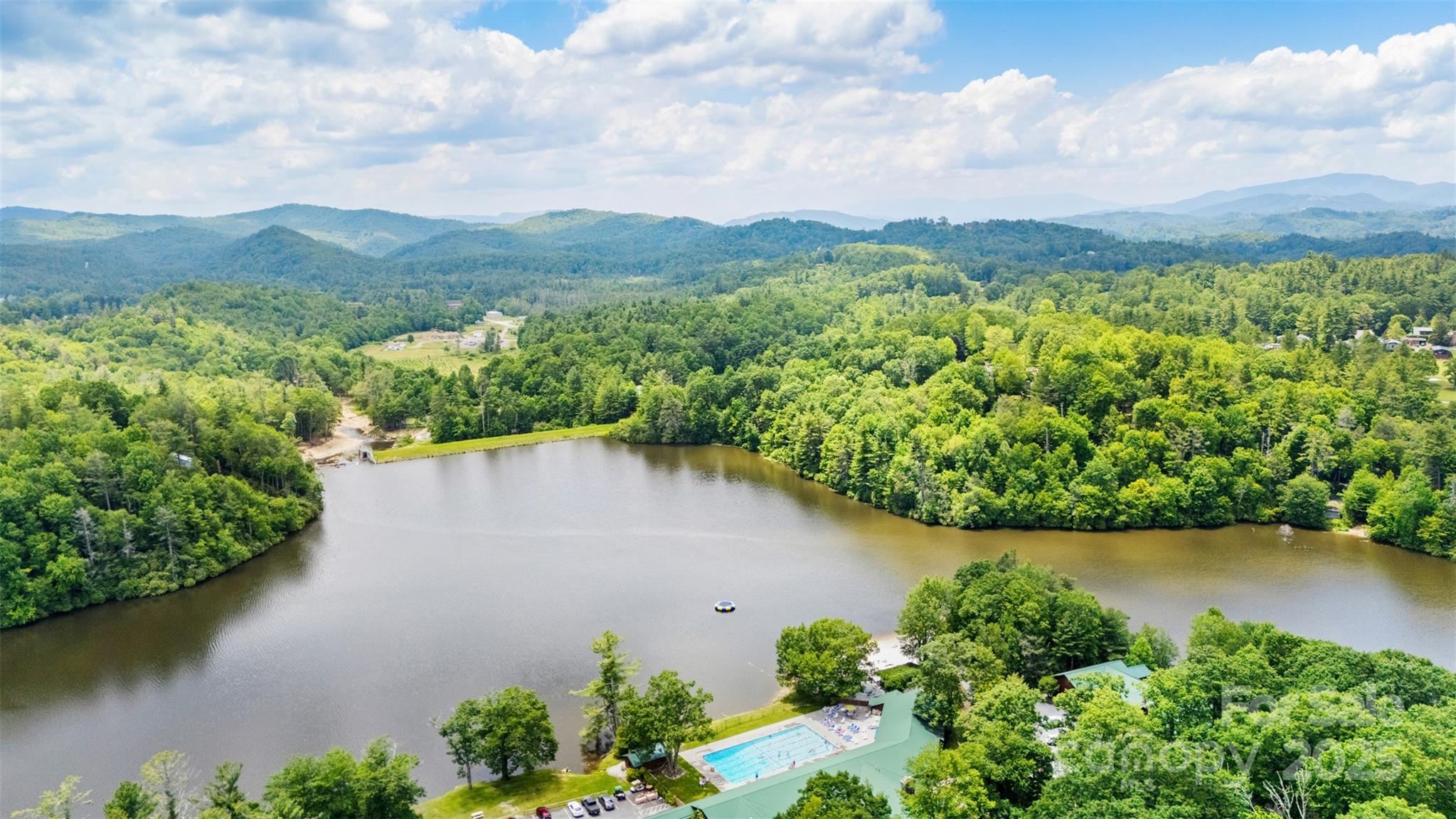 140 Pine View Road, Unit 43 Newland, NC 28657 - Photo 9 of 29 an aerial view of a houses with lake view