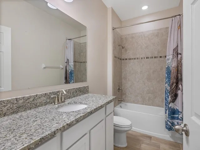 a view of a city street from a yard