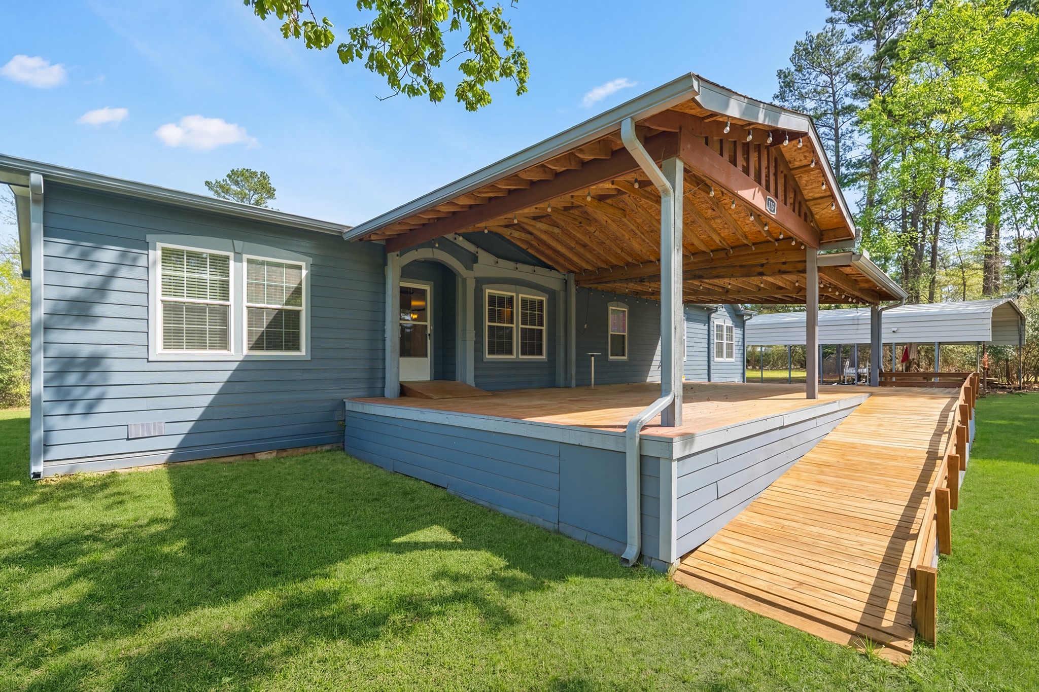 115 Canadian Drive Trinity, TX 75862 - Photo 5 of 42 Another view of the covered porch.