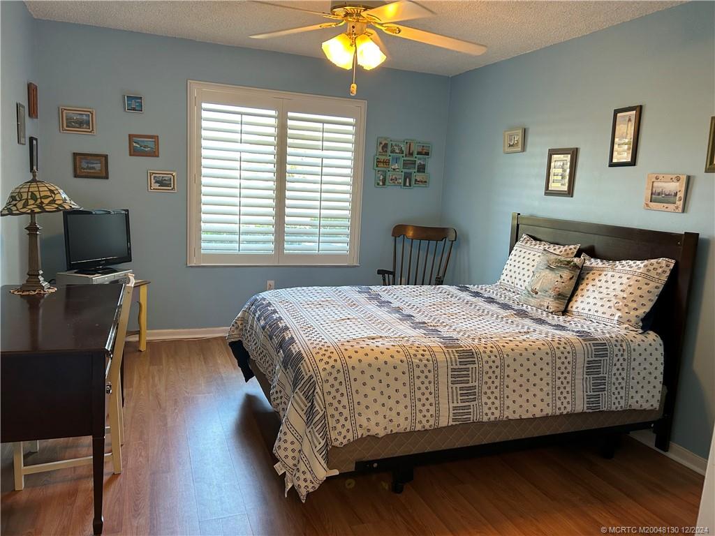 5355 Southeast Miles Grant Road, Unit E114 Stuart, FL 34997 - Photo 10 of 15 Master bedroom