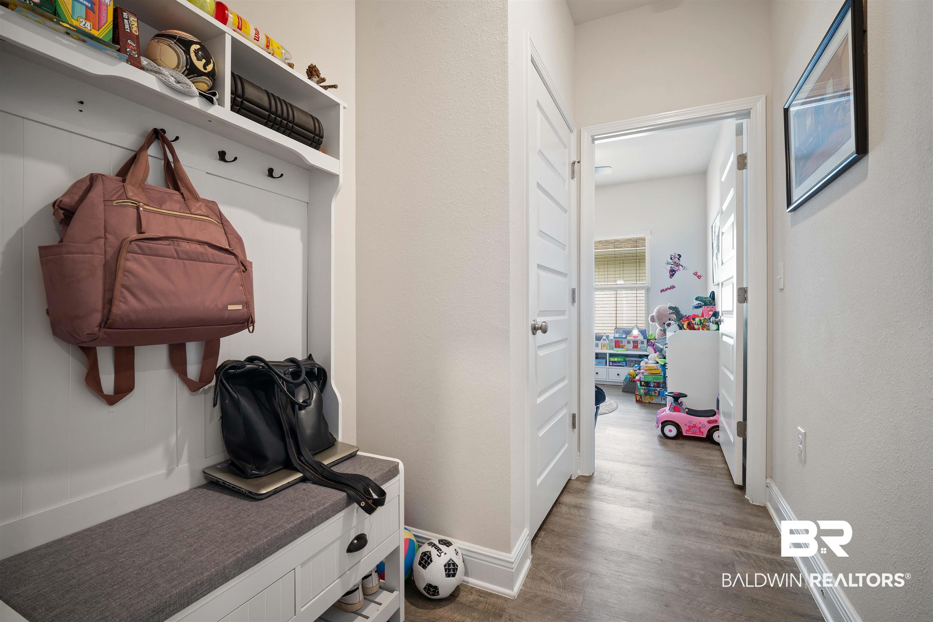 11021 Native Dancer Way Daphne, AL 36526 - Photo 23 of 35 Mudroom featuring wood finished floors and baseboards