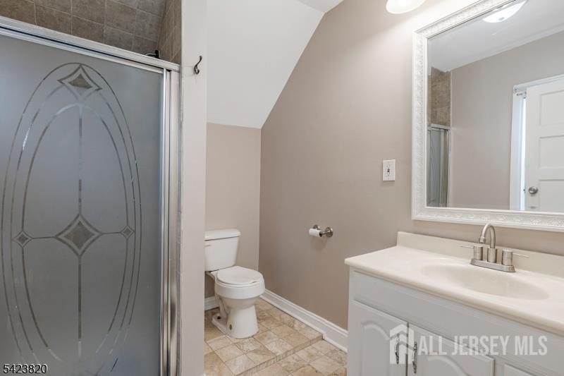 110 Parker Street Middlesex, NJ 08846 - Photo 15 of 25 a bathroom with a sink a toilet and shower