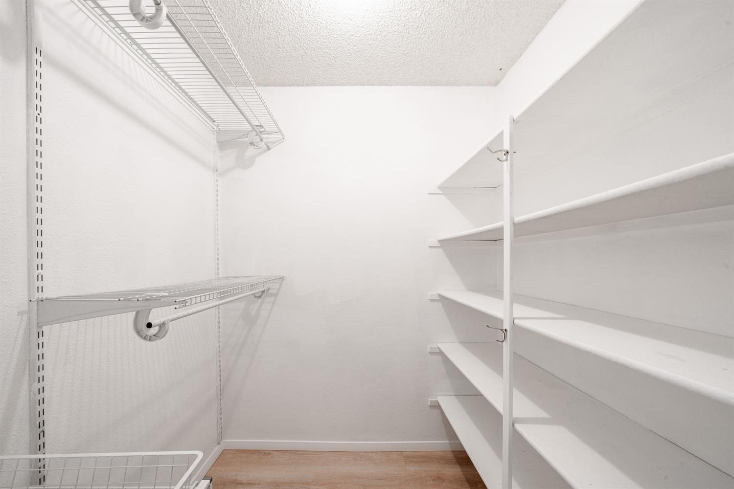 12502 Road 37 1/2 Madera, CA 93636 - Photo 26 of 79 a view of small space with racks on the wall